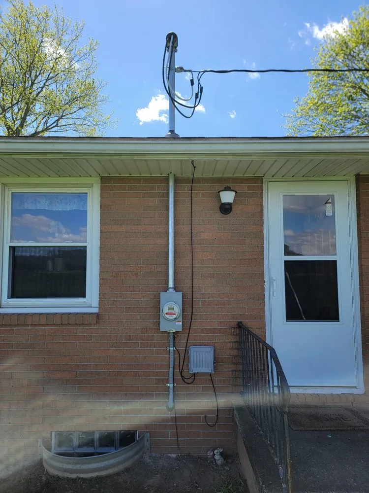 Professional electrician providing panel upgrade in Dellroy, OH - 171 Electric