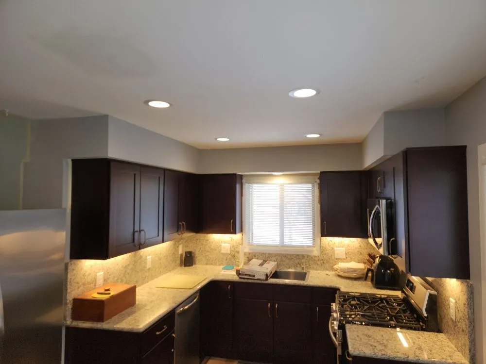 Emergency electrician providing panel upgrade in , 