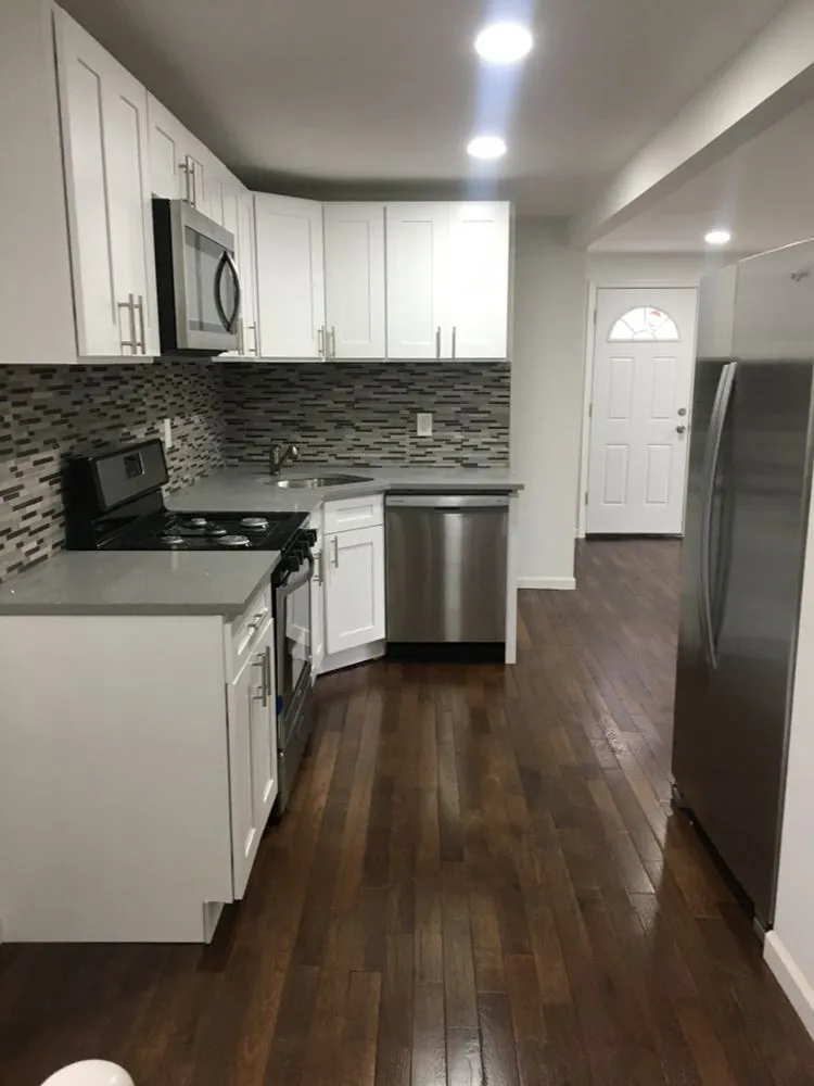Expert electrician providing panel upgrade in East Elmhurst, NY - 4j's Construction