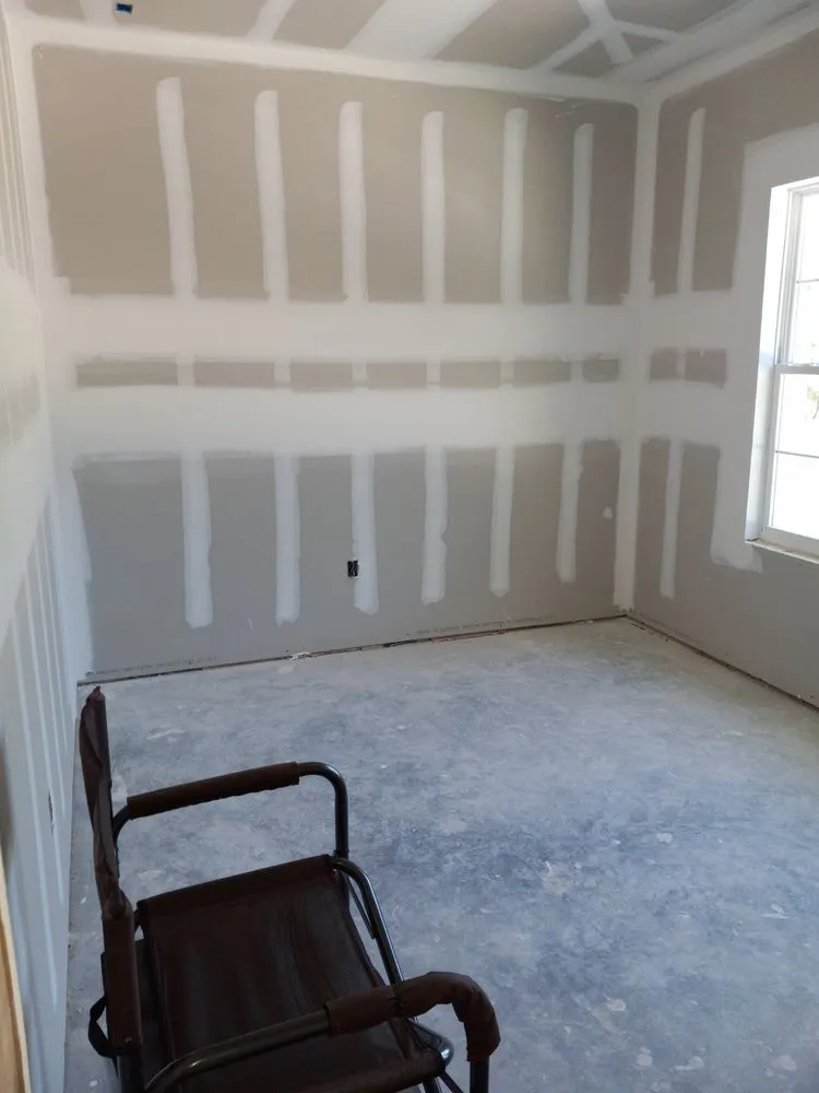 Slide of A and J Drywall repair