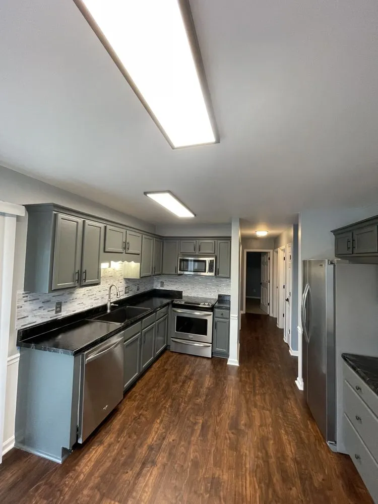 Emergency electrician providing panel upgrade in Winston-Salem, NC - A Plus Designer