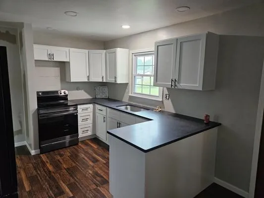 AA&J Construction Logo