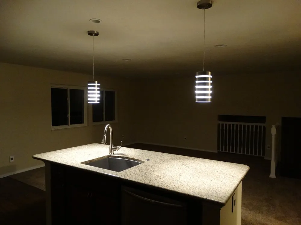 Professional electrician providing wiring installation in ,