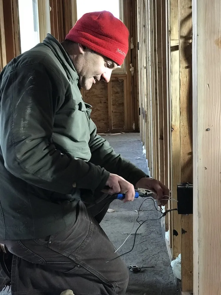 Slide of AJ's Electric