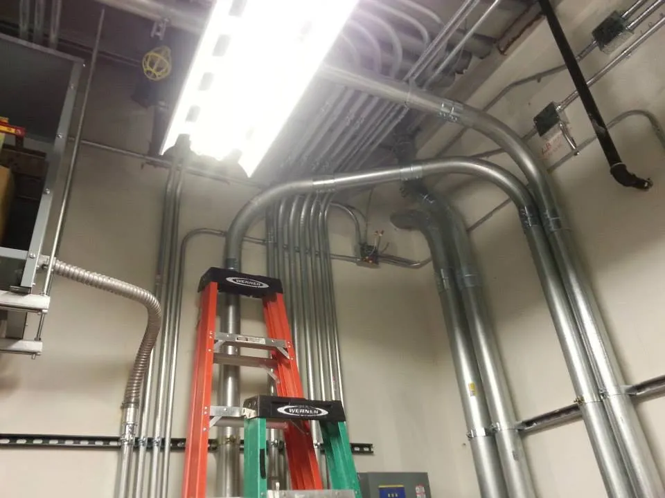 Certified electrician providing panel upgrade in , 