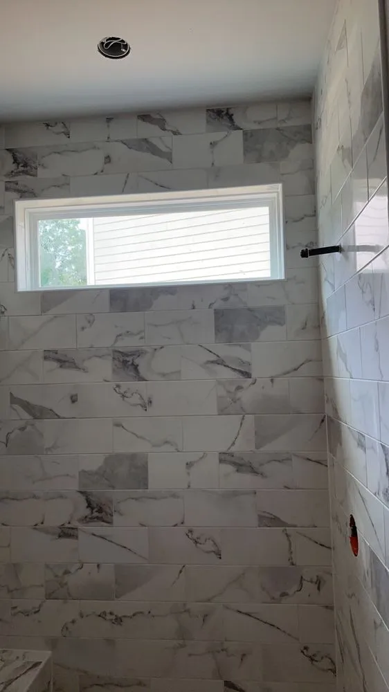 Slide of Alexander’s Tile & Home Renovations