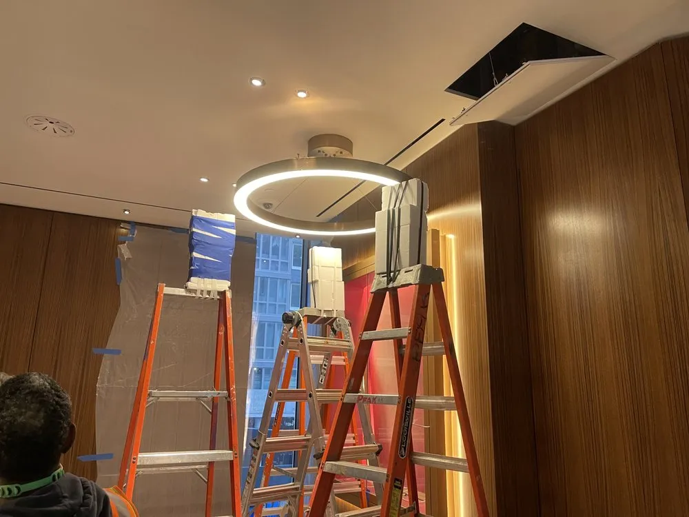 Slide of All American electric contractor