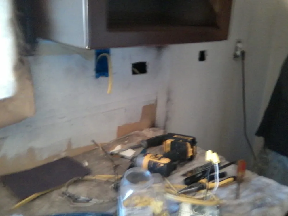 Certified electrician providing panel upgrade in , 