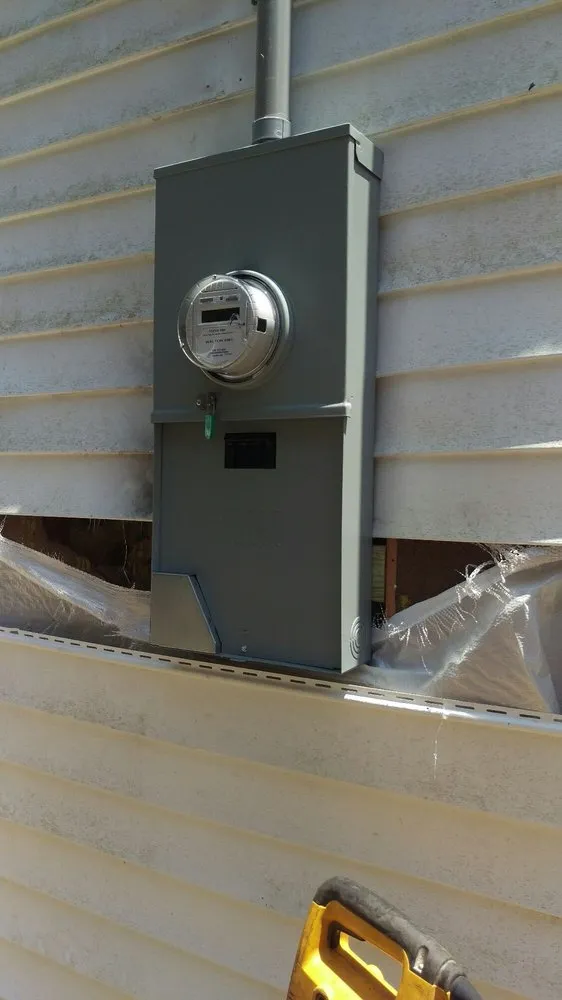 Reliable electrician providing panel upgrade in , 