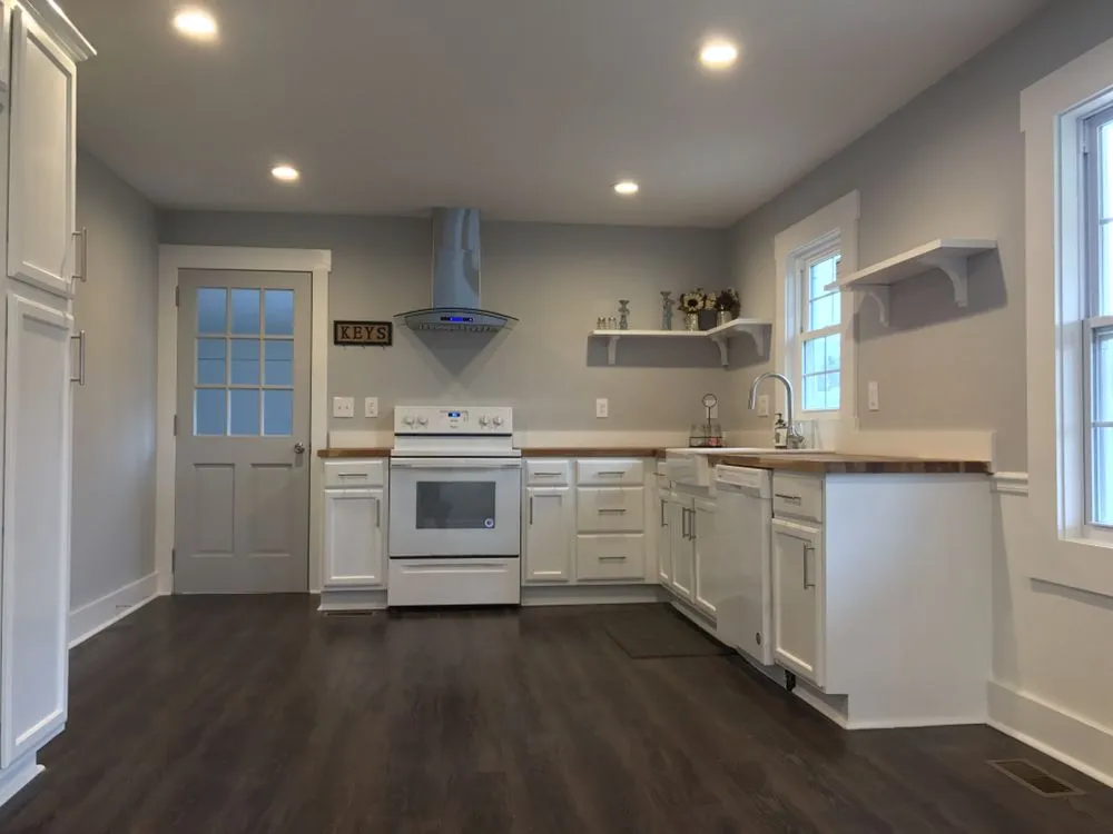 Slide of Alpha Contracting & Real Estate Group