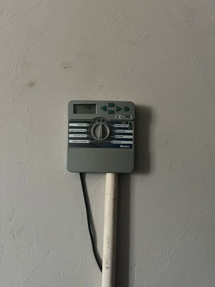 Slide of Andy's Sprinkler, Drainage & Lighting