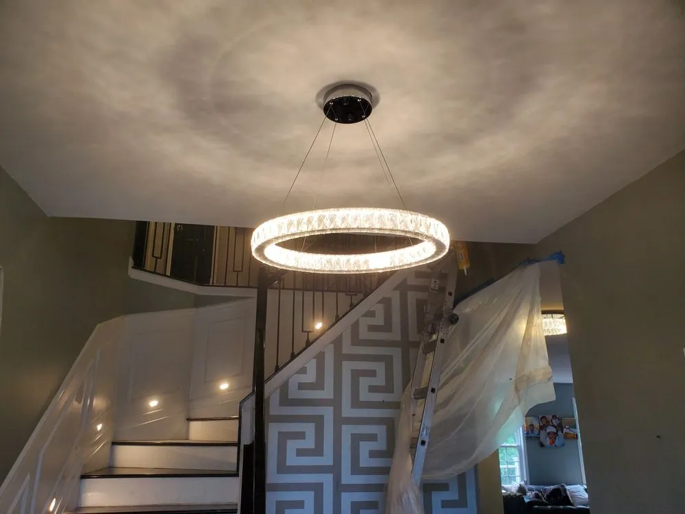 Professional electrician providing lighting installation in , 