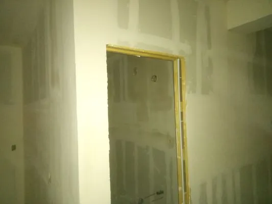 Arellano Remodeling Logo