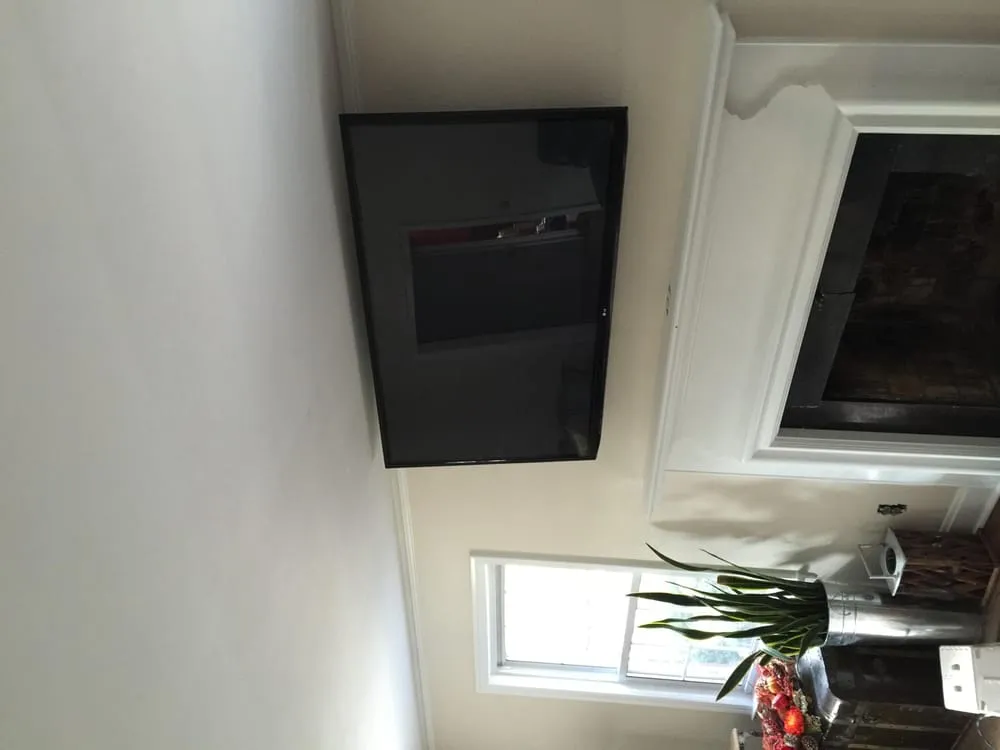 Professional electrician providing outlet and switch repair in Kingston, MI - Ark Electric