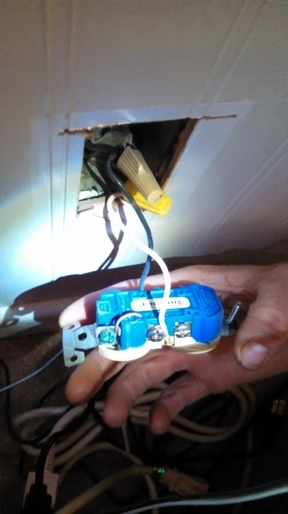 Professional electrician providing lighting installation in Hayes, VA - Asbury Electric