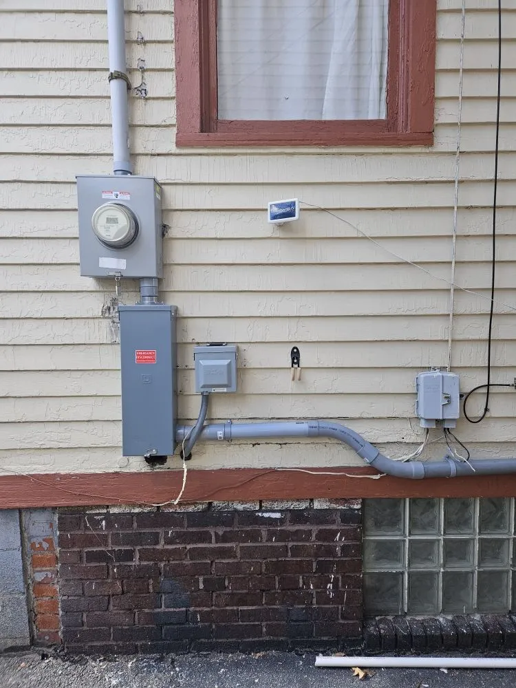 Emergency electrician providing panel upgrade in ,