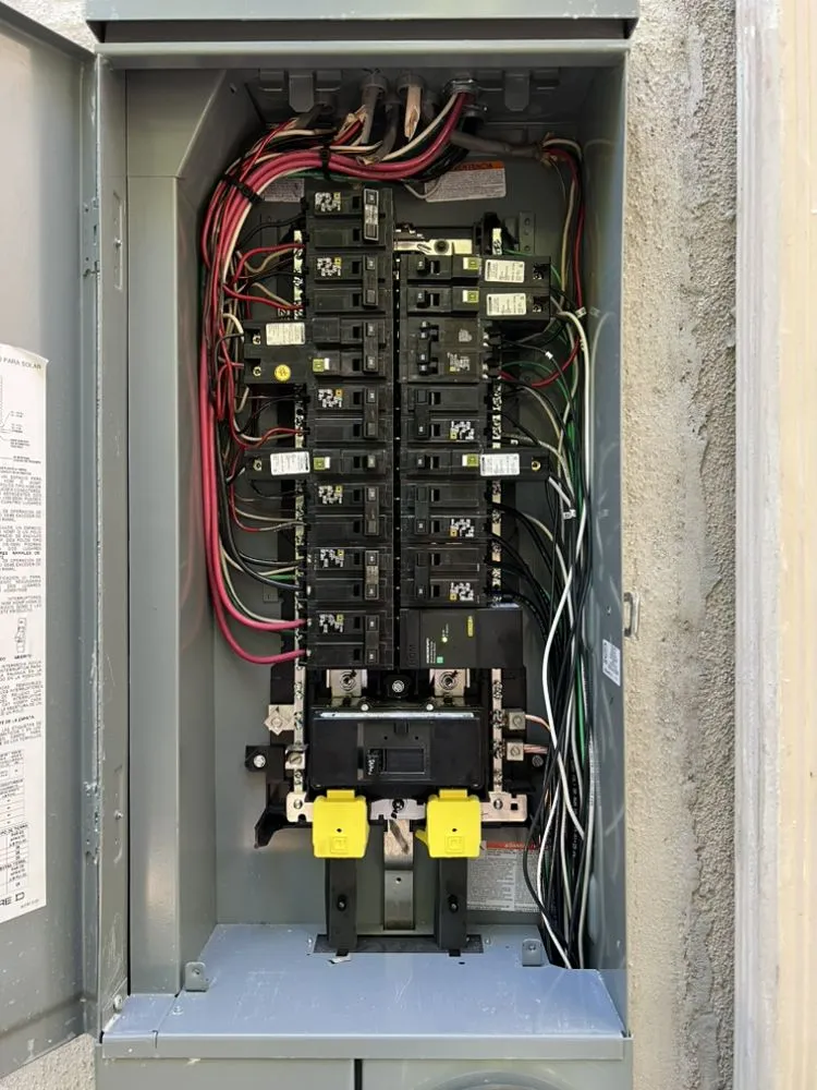 Licensed electrician providing panel upgrade in , 
