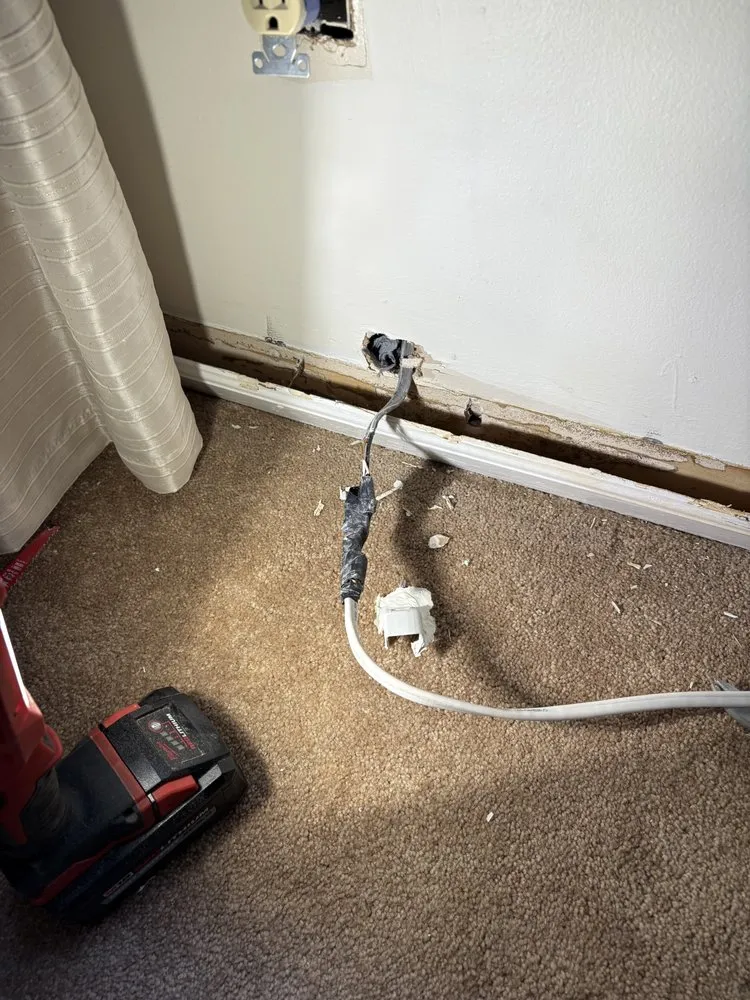 Professional electrician providing panel upgrade in , 