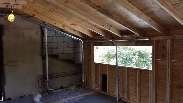 B Rhodes Electric Logo