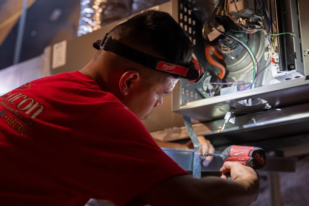 Slide of Bacon Plumbing Heating Air Electric