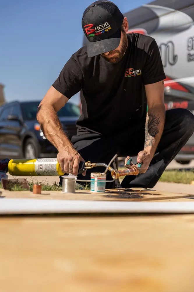 Slide of Bacon Plumbing Heating Air Electric