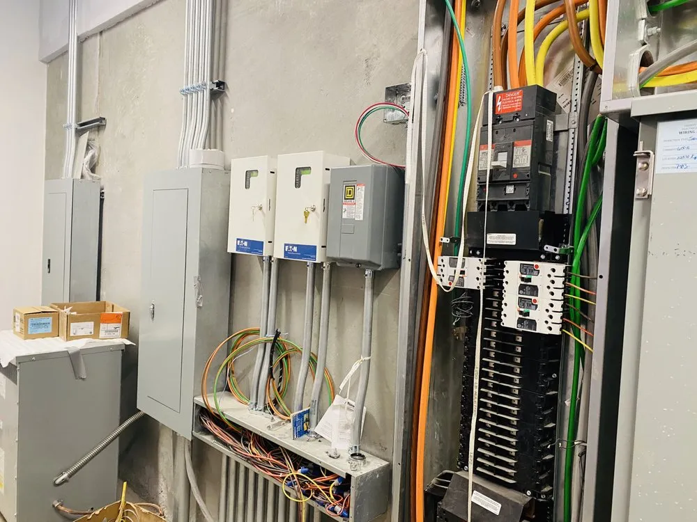 Licensed electrician providing panel upgrade in ,