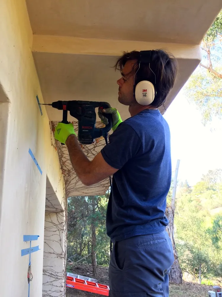 Certified electrician providing outlet and switch repair in , 