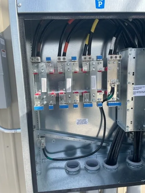 Expert electrician providing emergency electrical service in Collins, IA - Black Dog Electric