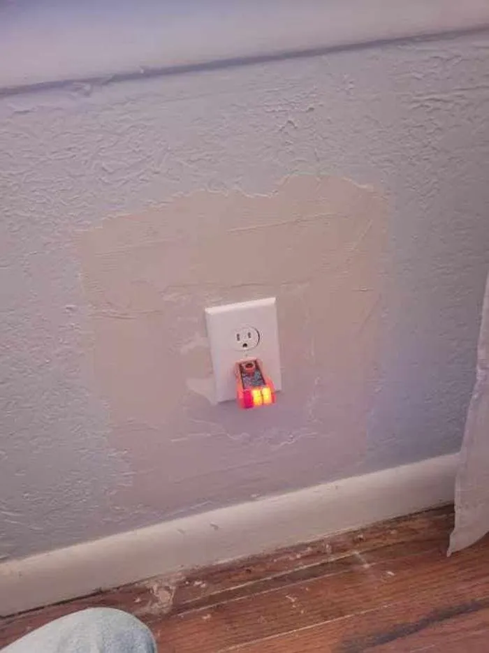 Slide of Black Electrical Experts