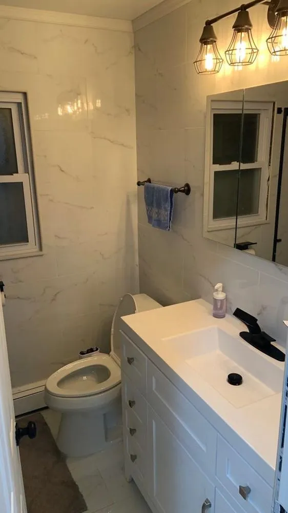 Slide of Blue Wave Home Renovation