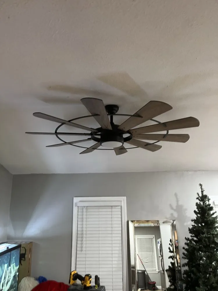 Professional electrician providing panel upgrade in ,