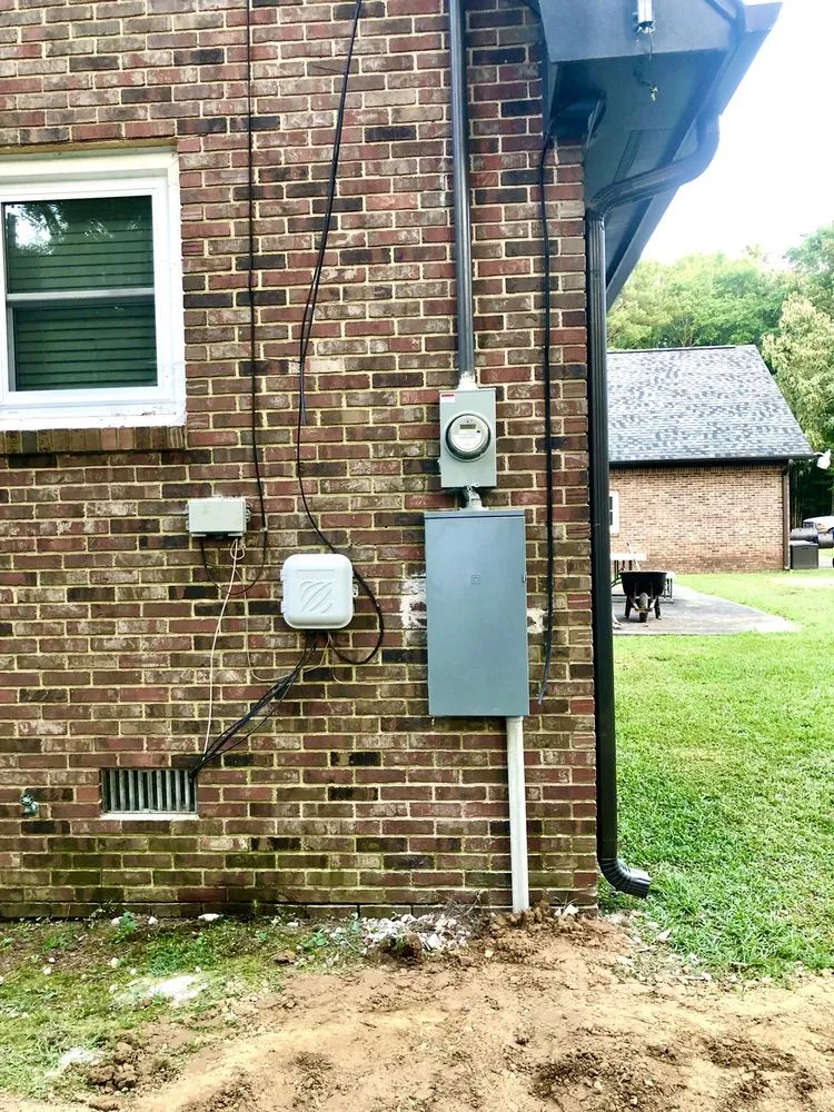 Professional electrician providing outlet and switch repair in , 