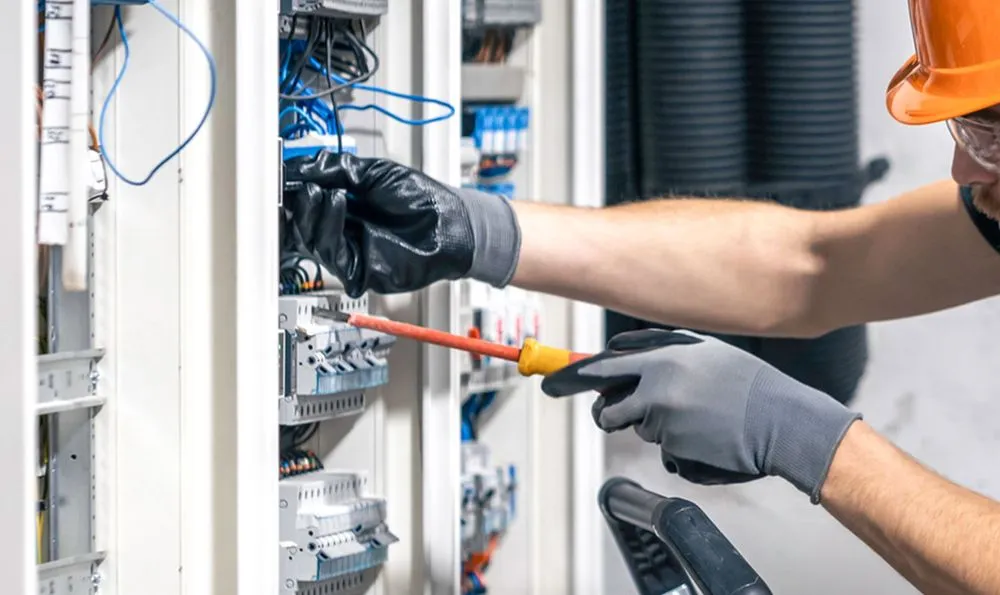 Certified electrician providing outlet and switch repair in Lennon, MI - Byers Electric Service Team