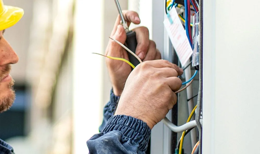 Licensed electrician providing wiring installation in Lennon, MI - Byers Electric Service Team