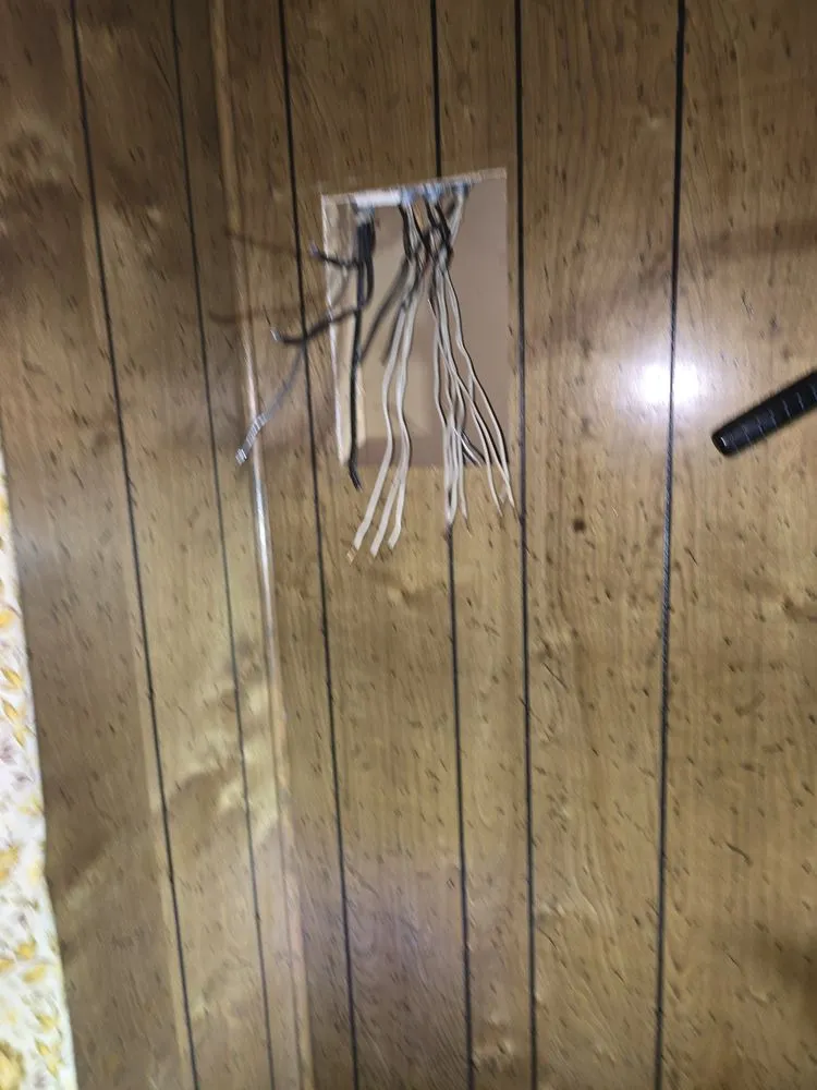 Professional electrician providing emergency electrical service in , 