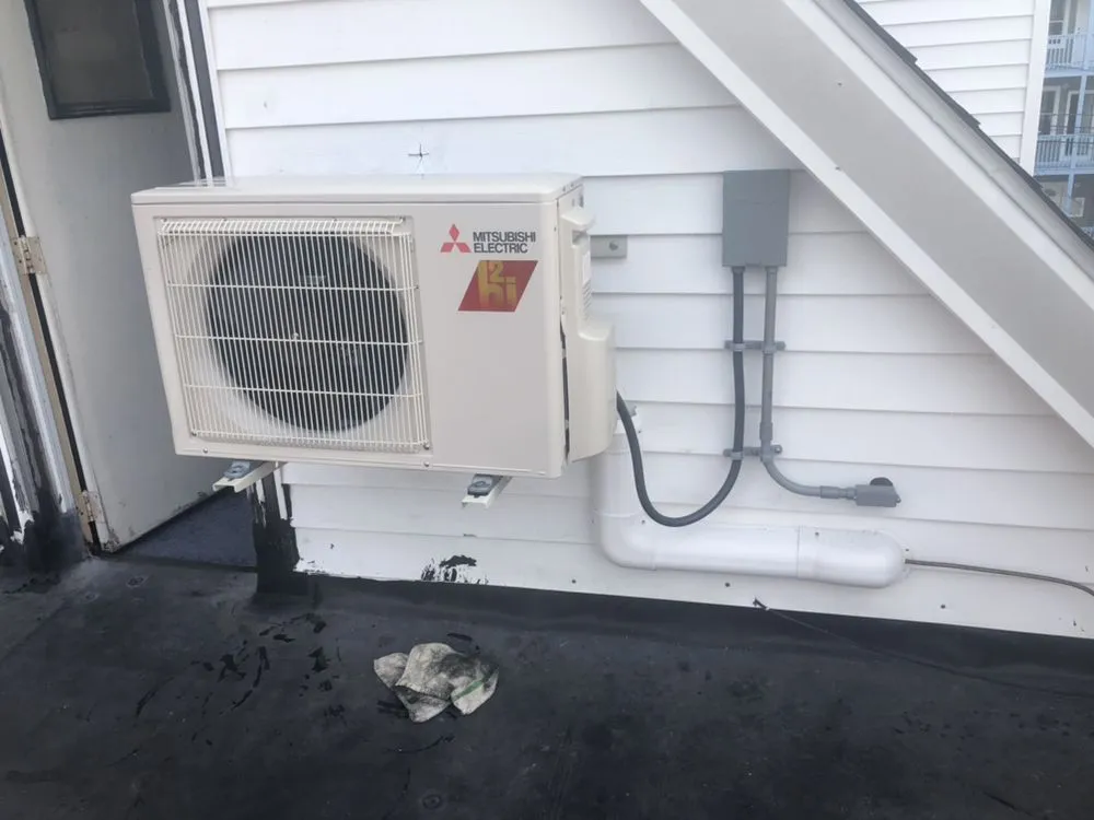 Slide of Carmen Colella Electric