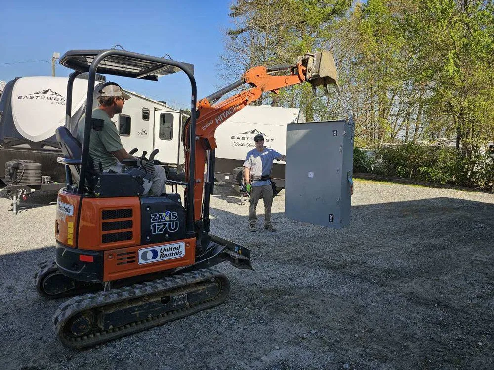 Certified electrician providing panel upgrade in , 