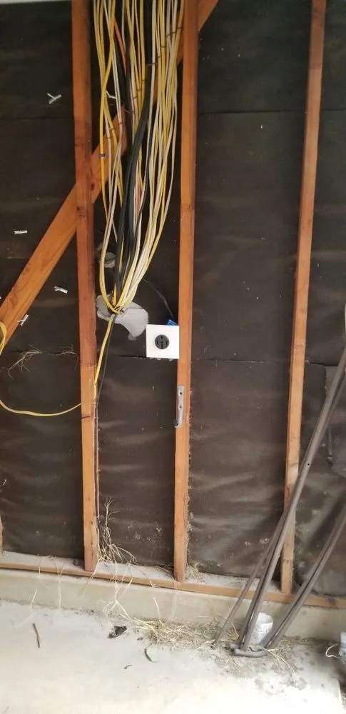 Licensed electrician providing outlet and switch repair in ,