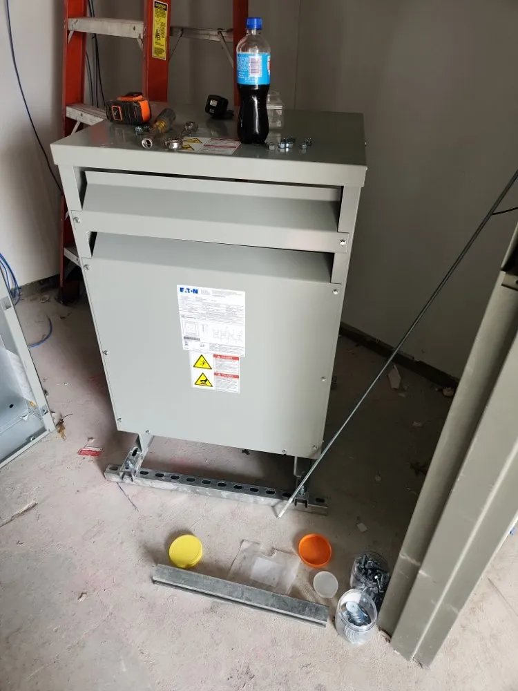 Professional electrician providing panel upgrade in , 