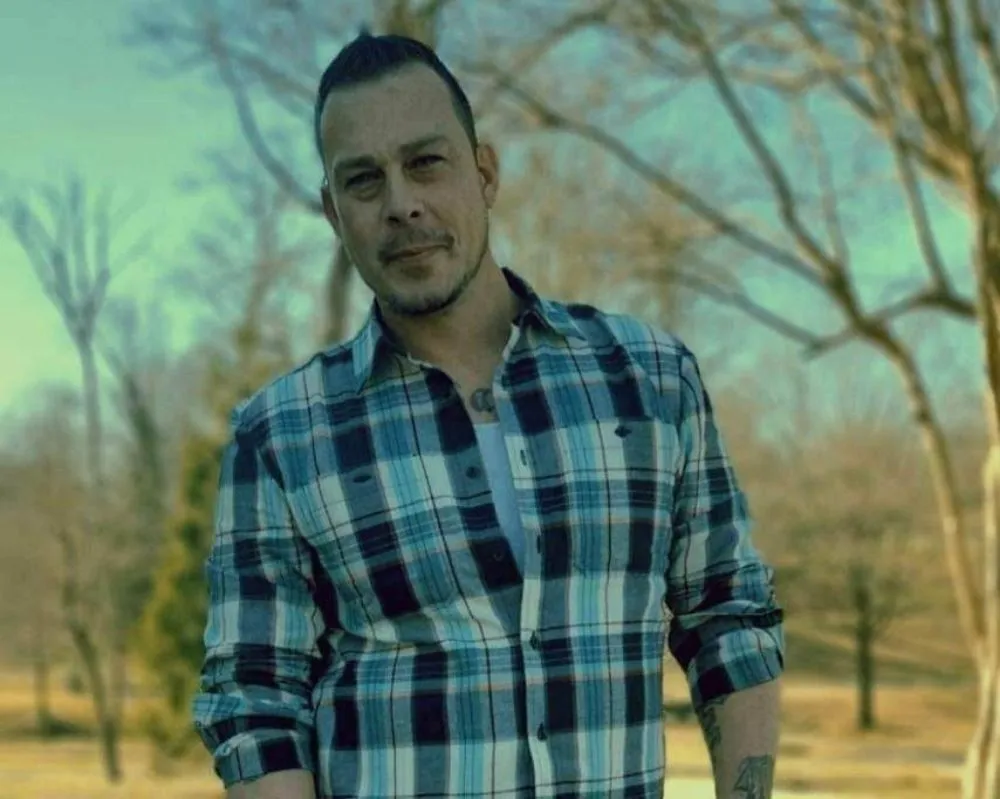 Slide of Chris and Sons