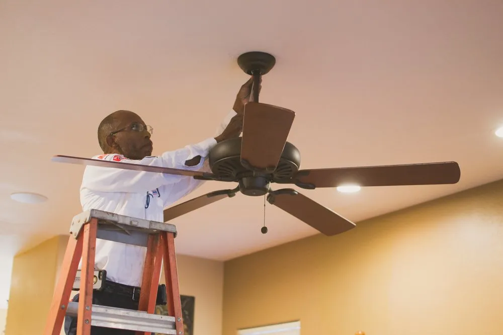 Professional electrician providing panel upgrade in , 