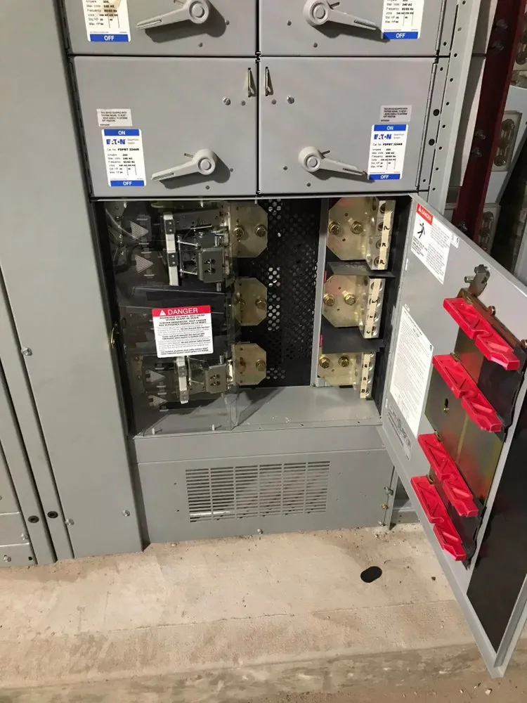 Emergency electrician providing panel upgrade in , 