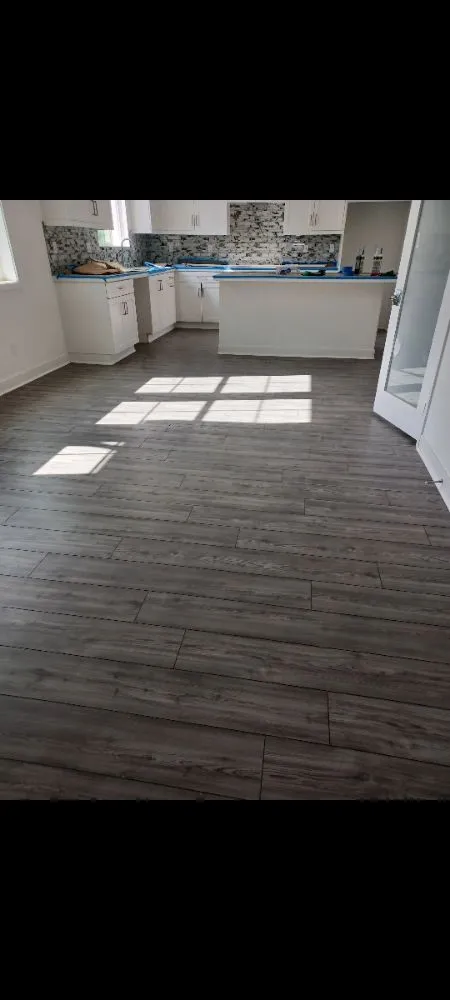 Slide of Cobos Flooring and Electric