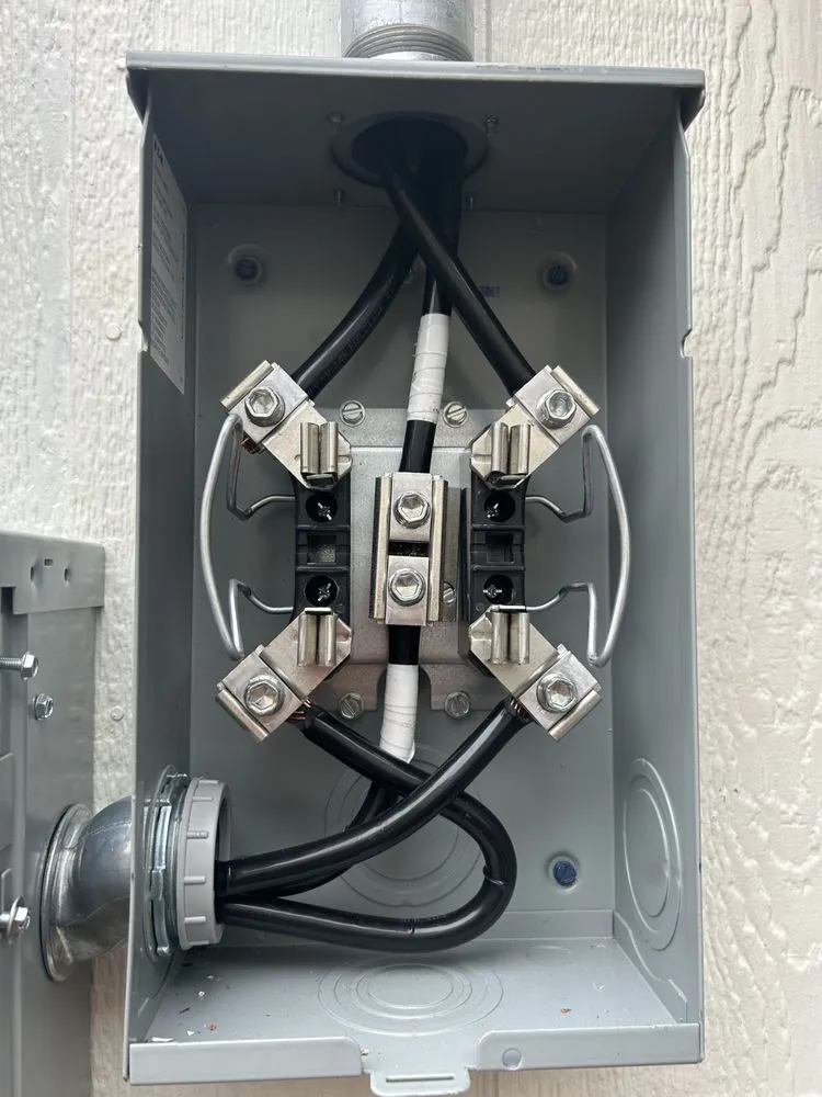 Emergency electrician providing panel upgrade in ,