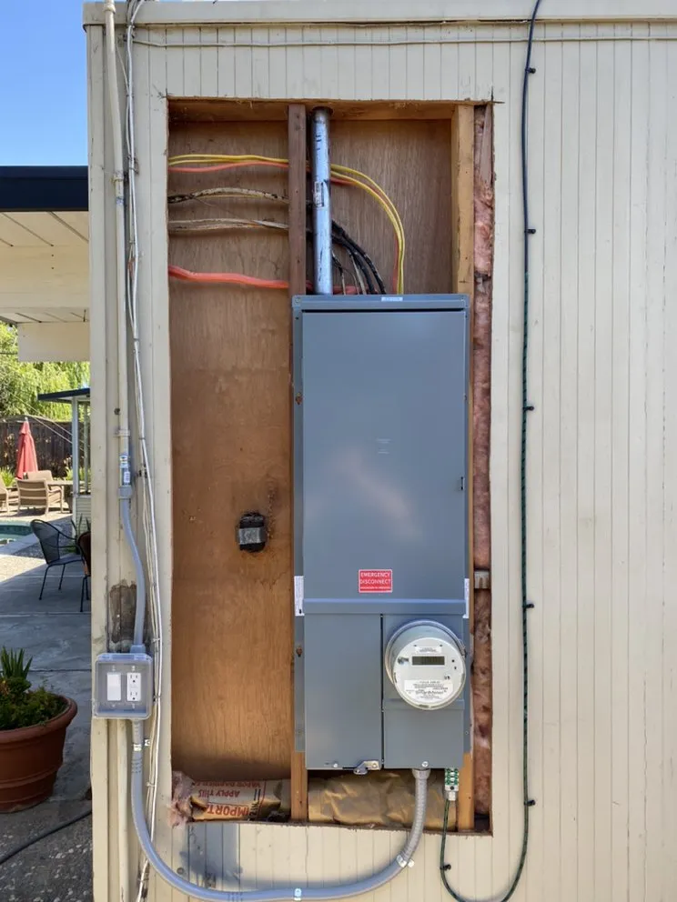 Emergency electrician providing panel upgrade in , 