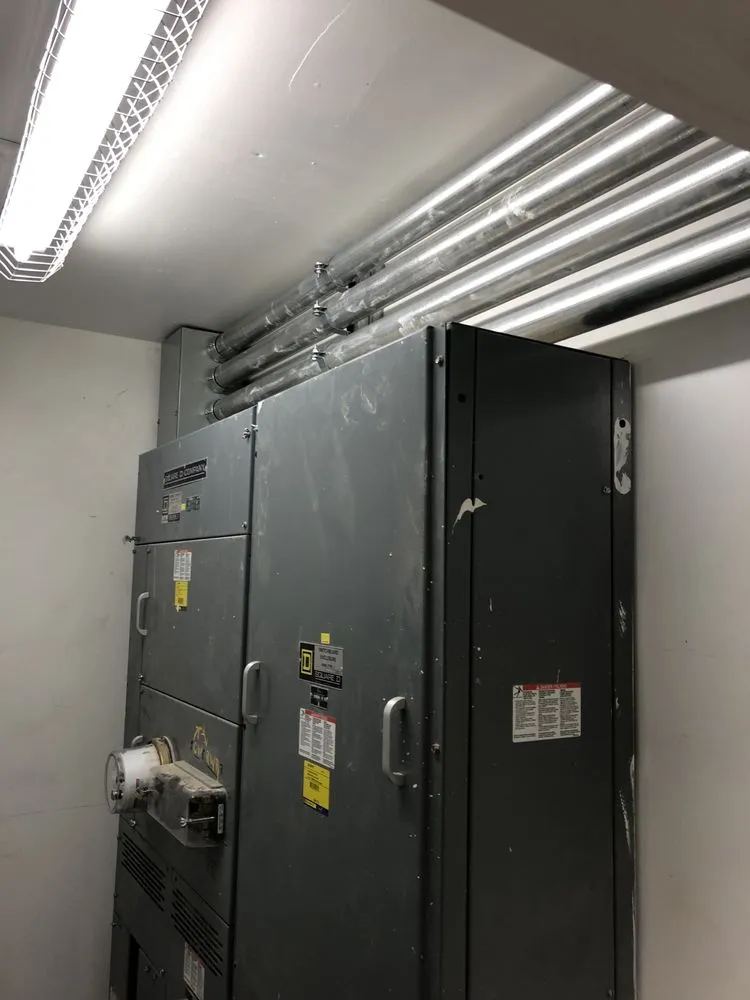 Emergency electrician providing panel upgrade in ,