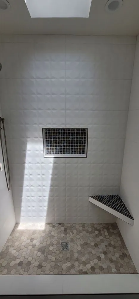 Slide of Deluxe Remodeling