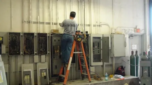 Slide of DJ Electric Services