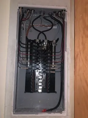 Dollens Electric Logo