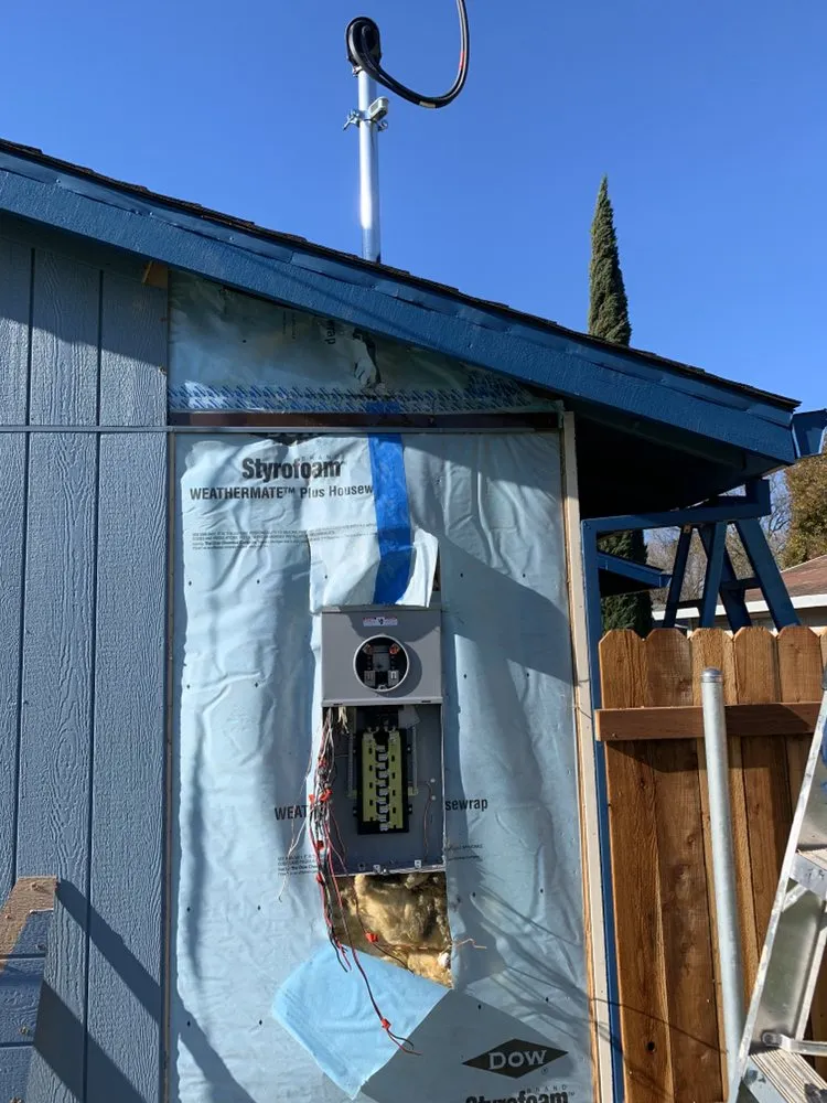 Professional electrician providing panel upgrade in , 